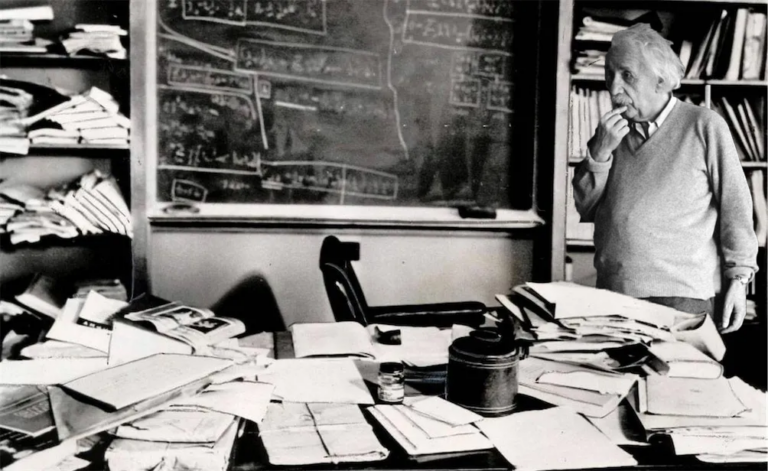 Einstein Contemplating a Messy Desk